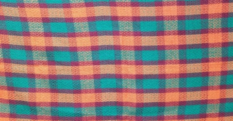 Orange and blue-ish green plaid tapestry
