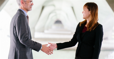 Business people shaking hands