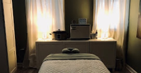 Comfortable bed at Emerald Massage Center
