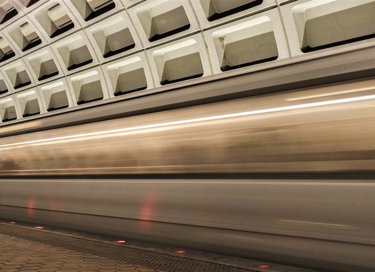 Metro train speeding by in a blur