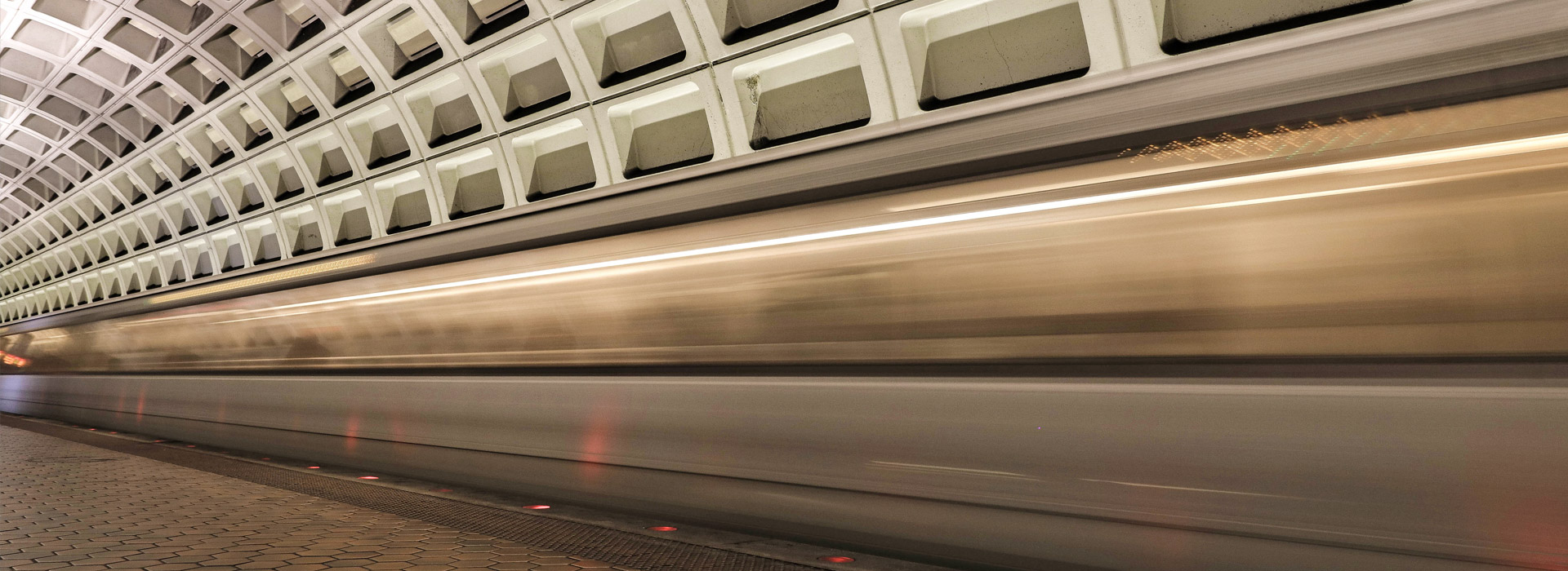 Metro train speeding by in a blur